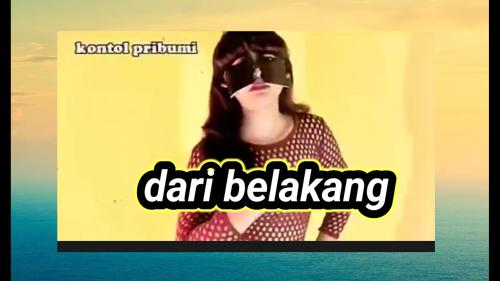 Dari belakang